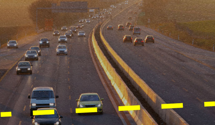 heavy highway traffic at dusk
